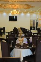 Una televisión o centro de entretenimiento en Kabul Taj Hotel