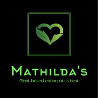 ein grünes Logo mit einem Herz in der Mitte in der Unterkunft Furnished Simcoe Lofts in Oshawa