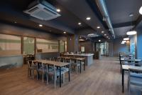 a dining room with tables and chairs at Anook Ryokan Hotel Songtan in Pyeongtaek