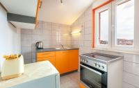 Kuchyňa alebo kuchynka v ubytovaní Apartments D&A