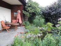 Vonkajšia záhrada v ubytovaní Ruhige Wohnung mit schönem Eigengarten in Seeboden am Millstättersee