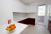 A cozinha ou cozinha compacta de Apartment Vista Makarska