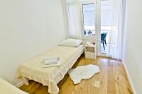 Posteľ alebo postele v izbe v ubytovaní Apartment Domalu Old Town