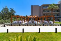 a wedding set up in front of a building at Cabú Hotel - Adults Only in Faliraki