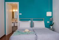 A bed or beds in a room at Keri Village & Spa by Zante Plaza (Adults Only)