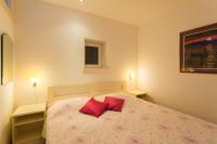 Posteľ alebo postele v izbe v ubytovaní Apartments Margaretic