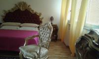 A bed or beds in a room at One M