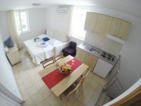 Kuchyňa alebo kuchynka v ubytovaní Apartments Tamarix
