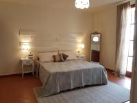 A bed or beds in a room at Il Borgo di San Gervasio