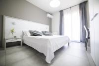 Posteľ alebo postele v izbe v ubytovaní Sikania Casa Diamond