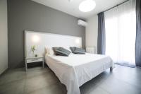 Posteľ alebo postele v izbe v ubytovaní Sikania Casa Diamond