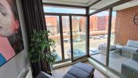 Ein Sitzbereich in der Unterkunft Waterlane Riverside - SPA, Pool, Gym &amp; Parking by Downtown Apartments