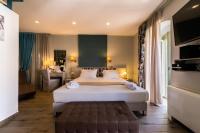 Fiscardonna Luxury Suitesにあるベッド
