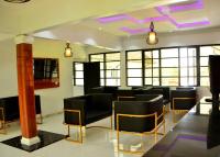 Χώρος καθιστικού στο Triple J's Inn & Apartments