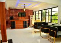 Η κουζίνα ή μικρή κουζίνα στο Triple J's Inn & Apartments