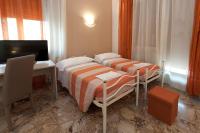 Posteľ alebo postele v izbe v ubytovaní Gardenia Guest House