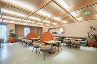 Un lugar para sentarse en Orange Hotel Beijing Fangshan Changyang Subway Station