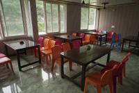 Posezení v ubytování Hotel Chauhan Palace