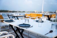 Restaurace v ubytování The White Roots Hotel