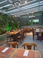 En restaurant eller et andet spisested på Apart-Hotel Vila Mariana