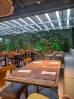 En restaurant eller et andet spisested på Apart-Hotel Vila Mariana