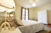 A bed or beds in a room at Il Borgo di San Gervasio