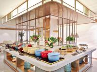 a buffet line with bowls and pots of food at Orange Hotel Beijing Qianmen Street in Beijing