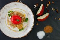 une assiette de nourriture avec une tomate rouge dessus dans l'établissement Urban Exec Suite with Free Gym Pass, Full Office Setup and Designated Parking Space, à Plovdiv