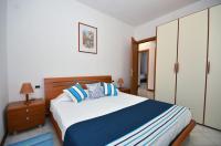 Ein Bett oder Betten in einem Zimmer der Unterkunft Verudela Villas