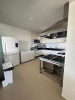 Una cocina o cocineta en Hotel Pacaraima