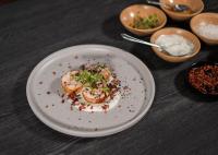 a plate of food on a table with ingredients at 10 2nd Avenue Houghton Estate by Dream Resorts in Johannesburg