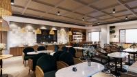 a restaurant with tables and chairs and a bar at Solace Suites Hotel & Banquets in Barog