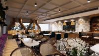 a restaurant with tables and chairs and a bar at Solace Suites Hotel & Banquets in Barog