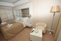 Postel nebo postele na pokoji v ubytování Alesta Yacht Hotel
