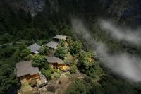 an aerial view of a house in the middle of a forest at Autumn Whisper Eden Villas in Wulong