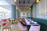 Ein Restaurant oder anderes Speiselokal in der Unterkunft Bellagio Beach Resort & Spa 