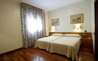 Postel nebo postele na pokoji v ubytování Hotel Los 5 Pinos