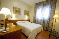 Postel nebo postele na pokoji v ubytování Hotel Los 5 Pinos