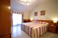 Postel nebo postele na pokoji v ubytování Hotel Los 5 Pinos