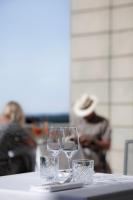 a pair of glasses sitting on a table at Hotel Villa La Bollina in Serravalle Scrivia