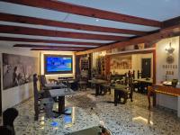 TV a/nebo společenská místnost v ubytování Oryx Guesthouse