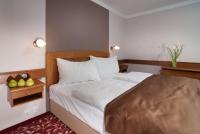 Postel nebo postele na pokoji v ubytování Wellness Hotel Windsor