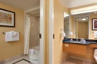 a bathroom with a sink and a toilet and a tub at Harrah's Lake Tahoe Hotel & Casino in Stateline