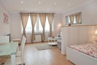 Posteľ alebo postele v izbe v ubytovaní Aurora Apartment Danube View