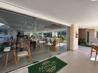 En restaurant eller et andet spisested på Resort Malia Beach Experience in Muro Alto