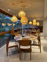 Et opholdsområde på Resort Malia Beach Experience in Muro Alto