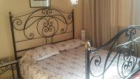 Postel nebo postele na pokoji v ubytování Ariha Hotel