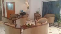 TV a/nebo společenská místnost v ubytování Ariha Hotel