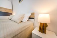Posteľ alebo postele v izbe v ubytovaní Apartment Lavander
