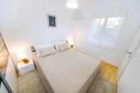 Posteľ alebo postele v izbe v ubytovaní Apartment Lavander
